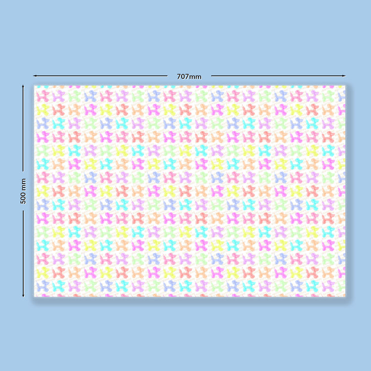 The Balloon Dog Birthday Wrapping Paper Sheets by My Favourite Colour is Rainbow  features colourful, pastel balloon animal patterns on a light background with "Happy Birthday " written in balloons diagonally, behind the balloon animals. A scale shows the wrapping paper measures 707 mm wide and 500 mm tall. 
 It is shown on a light blue background,