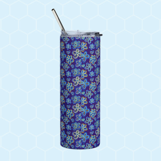 The Bloomscape Stainless Steel Tumbler by My Favourite Colour is Rainbow, a tall design with a metal straw, features a blue and yellow floral pattern.