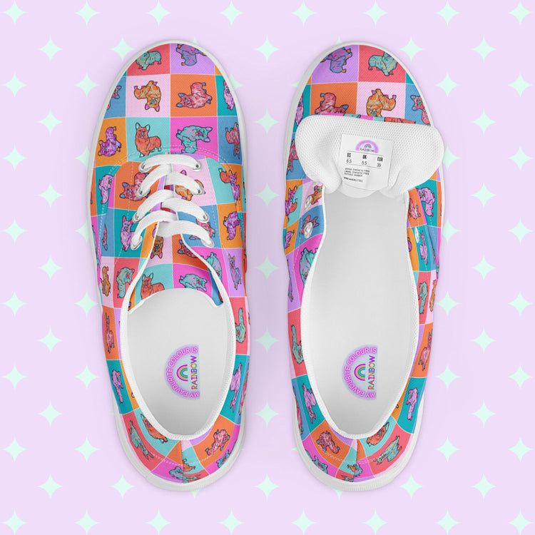 My Favourite Colour is Rainbows Crazi Corgis Canvas Sneakers are colourful lace-up shoes decorated with a pop art corgi design.  The inside of the shoe is white with My Favourite Colour is Rainbow branding on the footbed.  They have white laces and soles.