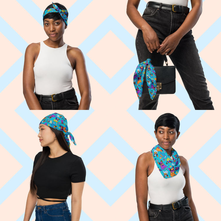 Four women show off the 'Frenchie Fetch, Set, Match' Bandana by My Favourite Colour is Rainbow.  They style it as a headband, necktie, handbag accessory, and headwrap while in casual outfits. The Frenchie Fetch, Set, Match Bandana showcases purple, orange, yellow and blue french bulldogs and tennis balls on a blue backdrop.