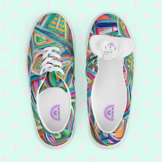 Experience the vibrant Geometric Rainbow Canvas Sneakers by My Favourite Colour is Rainbow. Features abstract patterns in green, blue, pink, and orange on a mint green background with pink diamonds. The left shoe is laced; the right displays the insole—a dazzling geometric rainbow style.