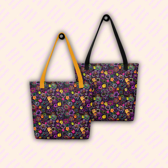 Two spacious In the Midnight Garden Tote Bags by My Favourite Colour is Rainbow hang side by side. One features a yellow strap, while the other sports a black one.  The bags feature colourful hand-drawn flowers on a black background.