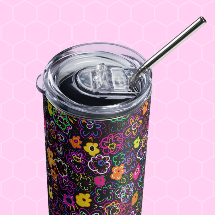 Introducing the In the Midnight Garden Stainless Steel Tumbler by My Favourite Colour is Rainbow: an insulated tumbler with a clear lid and metal straw, featuring a floral pattern on a light pink honeycomb background—merging style and sustainability in one reusable design.