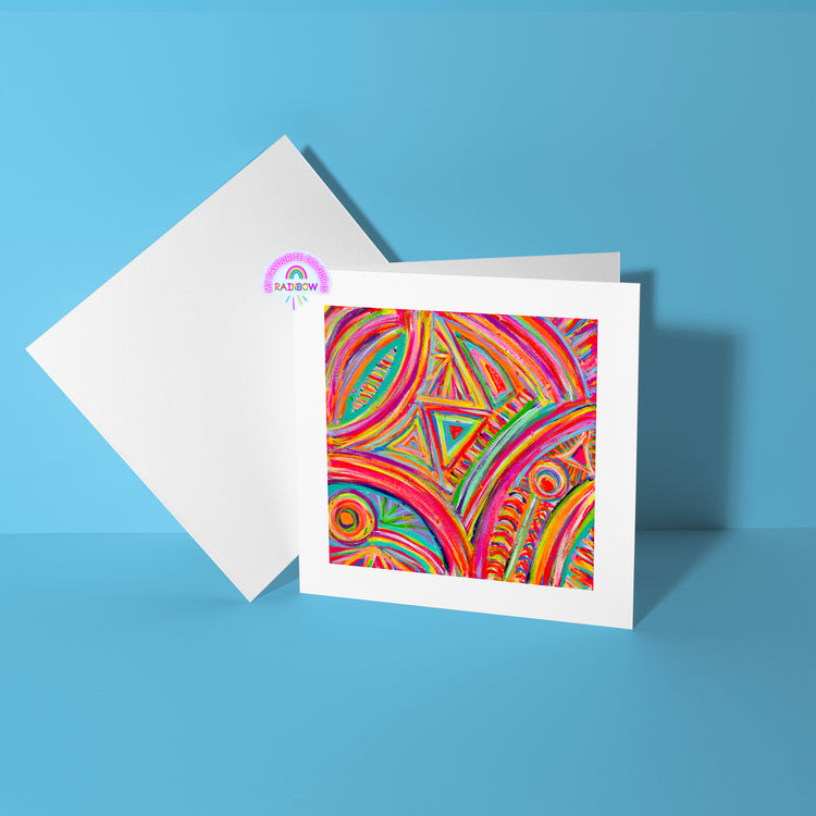 The Karma Kaleidoscope Greeting Card by My Store features vibrant abstract geometric patterns in red, orange, yellow, and green set against a bright blue background. A blank white card is included behind it for added elegance.
