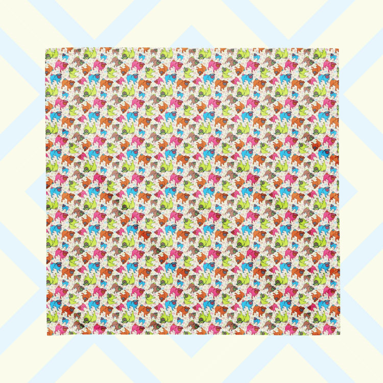 The Pugalicious Bandana by My Favourite Colour is Rainbow features a design of vibrant orange, blue, green, and pink pugs on a pale yellow background.