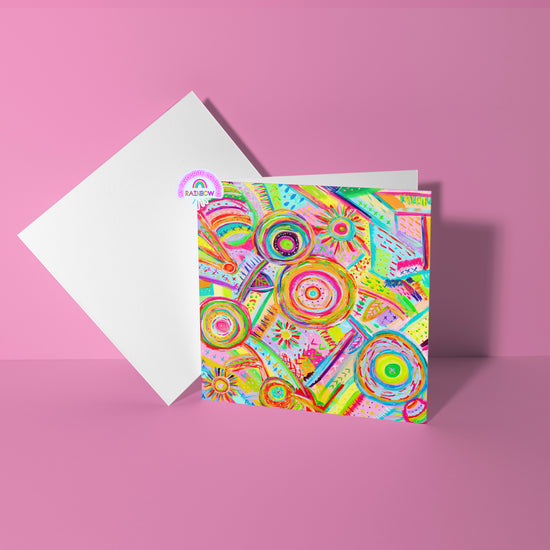 The Summer Sorbet Greeting Card by My Favourite Colour is Rainbow features vibrant geometric and circular patterns in neon hues on a pink backdrop, crafted on high-quality cardstock. It includes an envelope and a rainbow logo sticker.