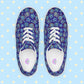 Introducing Bloomscape Canvas Sneakers from My Favourite Colour is Rainbow: vibrant lace-up shoes with a colourful blue and yellow floral pattern on a royal blue backdrop. They feature white laces, breathable lining, and white soles.