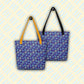 The Bloomscape Tote Bags by My Favourite Colour is Rainbow feature trendy blue floral patterns, one with yellow straps and the other with black straps. Made from durable cotton bull denim, these spacious tote bags are set against a light background with diagonal blue stripes.