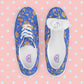 Top view of My Favourite Colour is Rainbow's Blue Summer Sorbet Canvas Sneakers, featuring a vibrant blue background and colourful pattern. The inside of the shoe tongue has a shoe size sticker and the internal fabric is white with  My Favourite Colour is Rainbow branding on the footbed.