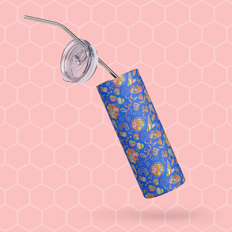 The Blue Summer Sorbet Stainless Steel Tumbler by My Favourite Colour is Rainbow features a mandala design and comes with a stainless steel straw and transparent lid. It hovers stylishly against a pink honeycomb-patterned background, blending style and sustainability.