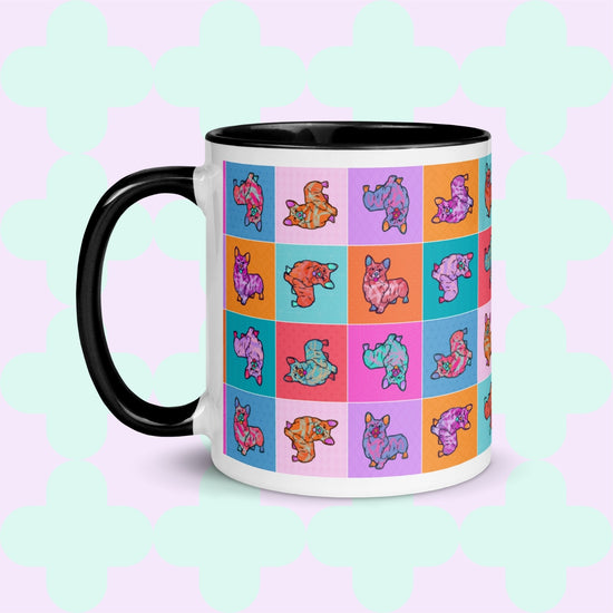 The Crazi Corgis Mug by My Favourite Colour is Rainbow is perfect for coffee lovers, featuring durable ceramic construction. It has a white body with a black handle and a vibrant grid of corgi illustrations in orange, pink, turquoise, and purple on a pastel green background with abstract shapes.