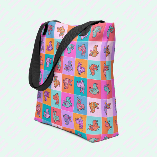 The Crazi Corgis Tote Bag by My Favourite Colour is Rainbow features vibrant corgis in playful poses. With black straps, this spacious design combines whimsy with practicality for dog lovers.