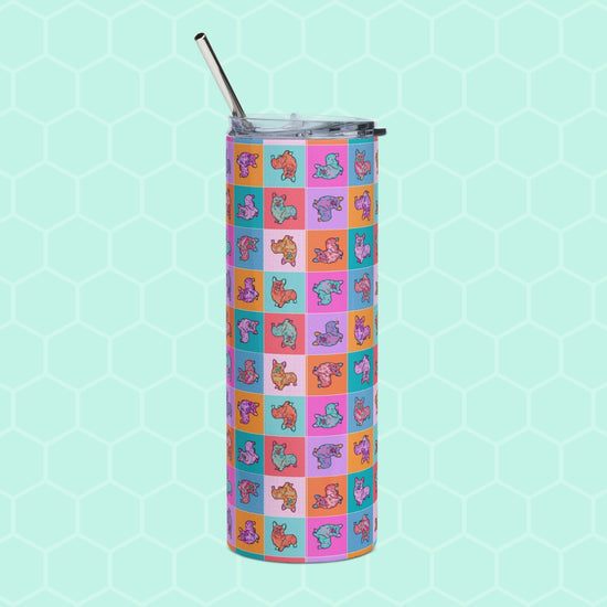 The Crazi Corgis Stainless Steel Tumbler by My Favourite Colour is Rainbow features a vibrant grid of cartoon dinosaurs in purple, orange, and teal hues. It includes a metal straw and has a light turquoise honeycomb background for an added quirky flair.