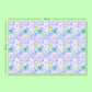 My Favourite Colour is Rainbows Floral Wrapping Paper Sheets measure 707mm by 500mm, featuring pastel pink, lavender, and green flowers on a light blue background.