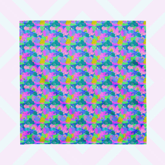 The Funfetti Bandana by My Favourite Colour is Rainbow features an abstract pattern with vibrant swirls, rainbows and stars in blue, pink, purple and green.