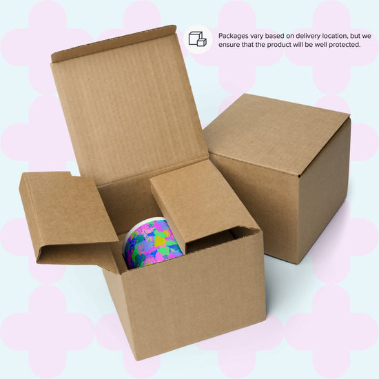 An open cardboard box reveals a vibrant Funfetti Mug with a floral design by My Favourite Colour is Rainbow, alongside a closed box. Background text notes: Packages vary by delivery location, but we ensure the ceramic product will be well protected.