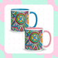 Explore the allure of Geometric Rainbow Mugs by My Favourite Colour is Rainbow! These ceramic mugs showcase colorful abstract designs: one with a blue handle and interior, the other with pink accents. Both are set against a pastel background with plus signs.