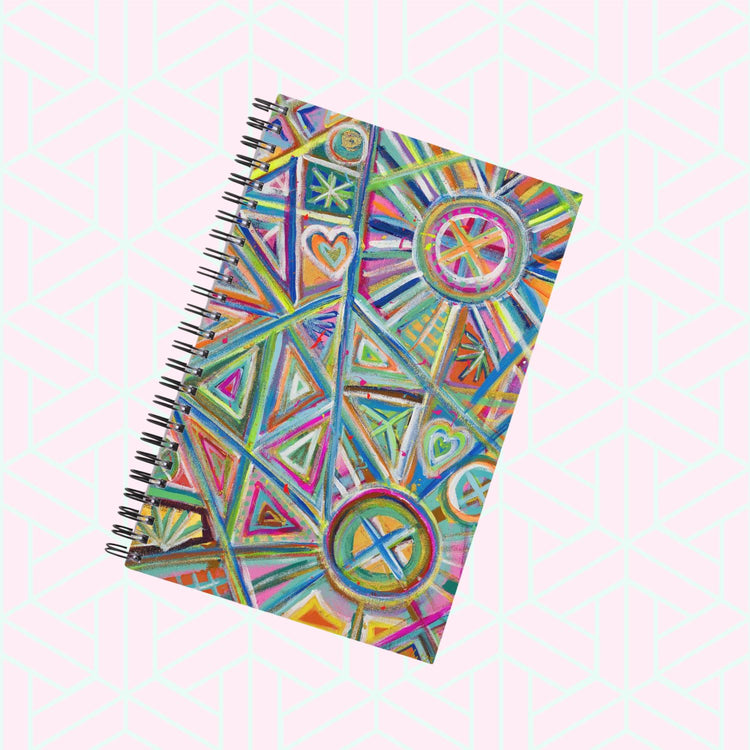 Introducing My Favourite Colour is Rainbow's Geometric Rainbow Notebook: A spiral-bound gem with an abstract cover of colourful geometric shapes like circles, triangles, and hearts on a light background—ideal for sparking creativity and adding brightness to your day.