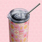 The Happy Smiles Sunny Days Stainless Steel Tumbler by My Favourite Colour is Rainbow features a cheerful design of smiley faces, hearts, flowers, and rainbows on a light pink honeycomb background with a clear lid and stainless steel straw.