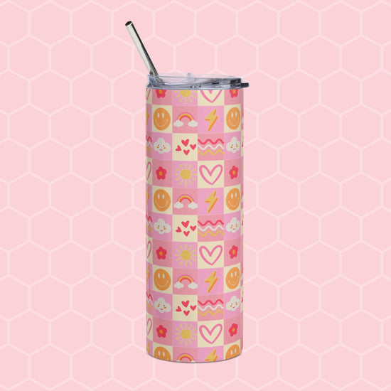 The Happy Smiles Sunny Days Stainless Steel Tumbler by My Favourite Colour is Rainbow features a metal straw and a vibrant design of smiley faces, hearts, clouds, suns, and lightning bolts in pink, yellow, and orange on a pink hexagonal background. Ideal for style-conscious tumbler users.