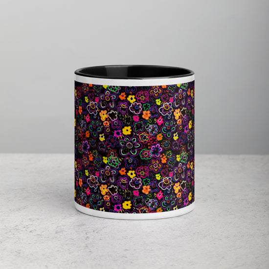 Front view of In the Midnight Garden Mug by My Favourite Colour is Rainbow showcases a vibrant multicoloured floral pattern on a black backdrop, featuring intricately detailed flowers in bright hues for a lively, cheerful look.