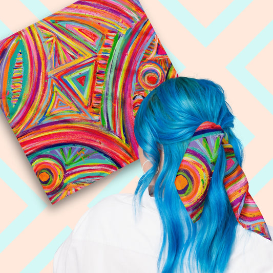 Two views of the Karma Kaleidoscope Bandana by My Favourite Colour is Rainbow.  At top left, a flat lay of the bandana.  At bottom right, a person with vibrant blue hair is seen from behind, wearing the Karma Kaleidoscope Bandana in her hair.