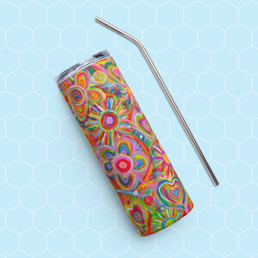 The My Favourite Colour is Rainbow Love in Neon stainless steel tumbler, adorned with vibrant heart and swirl patterns, sits on a light blue honeycomb backdrop. A sleek metal straw beside it enhances the chic way to enjoy iced coffee.