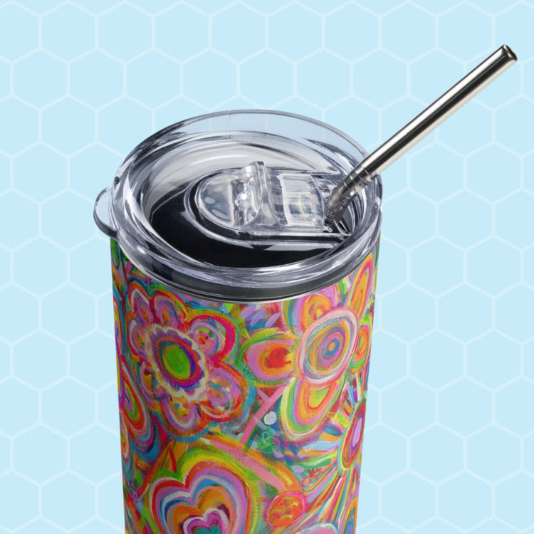 The My Favourite Colour is Rainbow Love in Neon Stainless Steel Tumbler features vibrant pink, orange, green, and blue abstract floral patterns. It includes a metal straw and is set against a light blue hexagonal background.