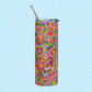 The Love in Neon Stainless Steel Tumbler by My Favourite Colour is Rainbow showcases vibrant heart, flower, and sun designs on a hexagonal-patterned backdrop. This colorful iced coffee tumbler with a straw stands tall against a light blue background.