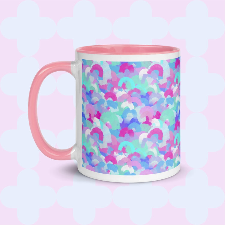 The Pastel Rainbow Mug by My Favourite Colour is Rainbow features soft watercolour rainbows in pink, blue, aqua and white. This version has a light pink handle and interior.