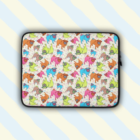 The Pugalicious Laptop Sleeve by My Favourite Colour is Rainbow features cartoon pugs with vibrant green, pink, blue, and orange hues.  The print is on only one side of the laptop sleeve, the other side is black.  It is shown on a pastel background.