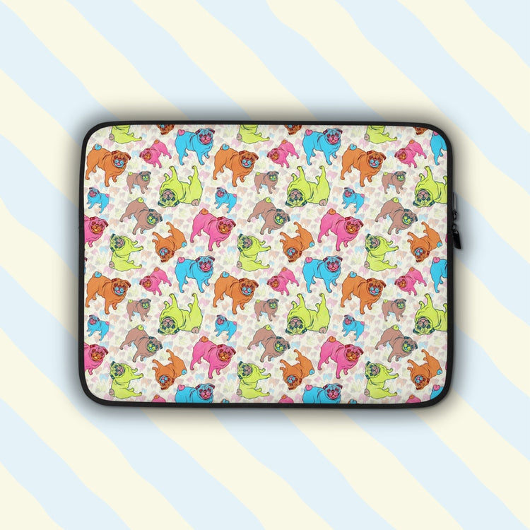 The Pugalicious Laptop Sleeve by My Favourite Colour is Rainbow features cartoon pugs with vibrant green, pink, blue, and orange hues.  The print is on only one side of the laptop sleeve, the other side is black.  It is shown on a pastel background.