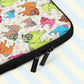 A close-up of the Pugalicious Laptop Sleeve by My Favourite Colour is Rainbow, featuring cartoon pugs with vibrant green, pink, blue, and orange hues.  It has two black zips and a padded zipper binding.  The print is on only one side of the laptop sleeve, the other side is black.  It is shown on a pastel background.