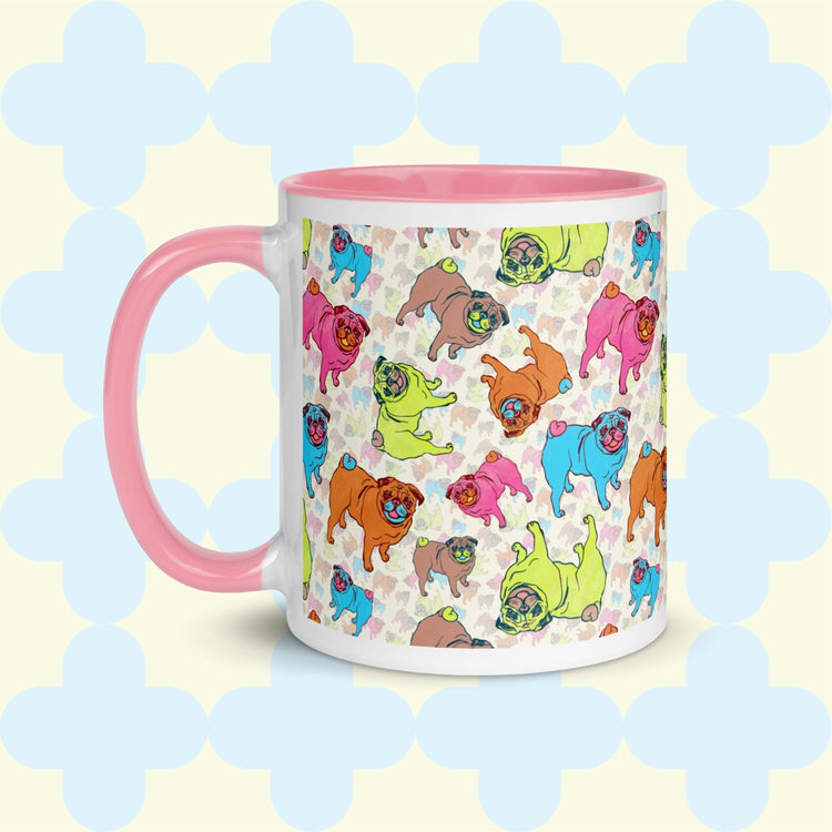 The Pugalicious Mug by My Favourite Colour is Rainbow delights pug lovers with colourful pug illustrations in orange, pink, green, blue, and brown. This version has a light pink handle and interior.