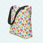 The Pugalicious Tote Bag by My Favourite Colour is Rainbow features a cartoon pug pattern in vibrant blue, pink, green, and orange. It has sturdy black straps.