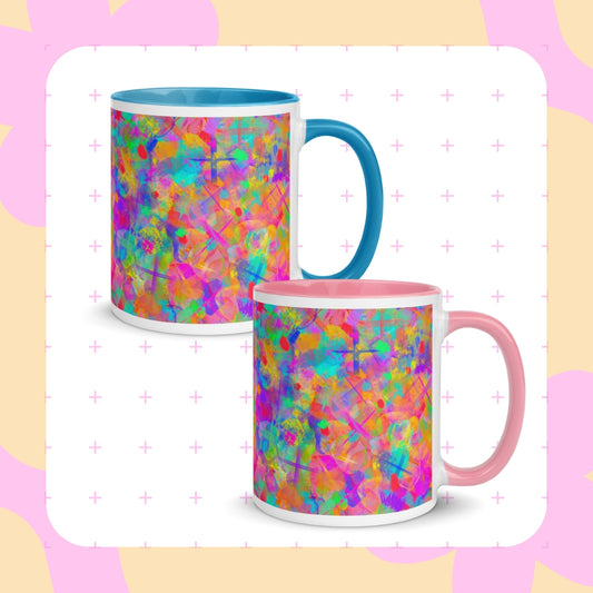 Two Splotches and Crosses mugs by My Favourite Colour is Rainbow, featuring abstract designs in rainbow hues. One has a blue handle and interior, the other pink. 
 Both mugs are set against a background with light pink crosses and curves.