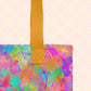 A close-up of the Splotches and Crosses Tote Bag by My Favourite Colour is Rainbow showing the sturdy yellow strap. 
 The bag features a vibrant abstract design in pink, blue, green, and yellow. 