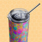 The Splotches and Crosses Stainless Steel Tumbler by My Favourite Colour is Rainbow features a vibrant abstract pattern with a clear lid and stainless steel straw, perfectly complemented by a whimsical pale yellow honeycomb background.