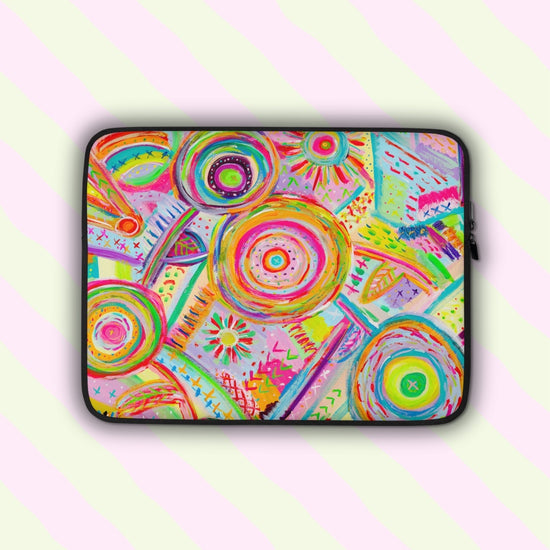 The Summer Sorbet Laptop Sleeve by My Favourite Colour is Rainbow features vibrant pink, blue, yellow, and green abstract patterns. Its scratch-proof and splash-resistant design stylishly protects your laptop.