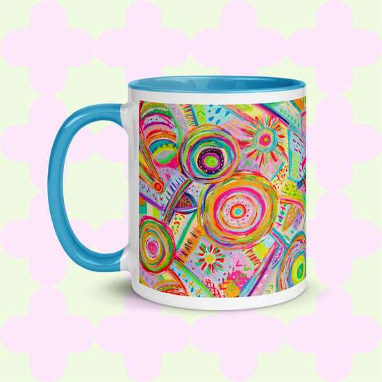 The Summer Sorbet Mug by My Favourite Colour is Rainbow features my Summer Sorbet painting: a vibrant abstract pattern of circles and swirls in bright colours.  This version has a light blue handle, and interior. 