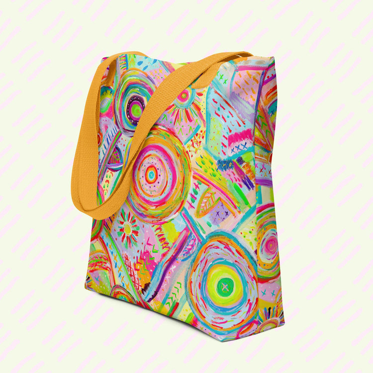 The Summer Sorbet Tote Bag by My Favourite Colour is Rainbow features my Summer Sorbet painting: vibrant abstract designs of circles and geometric shapes in bright pink, orange, blue, and green. This version features yellow handles.