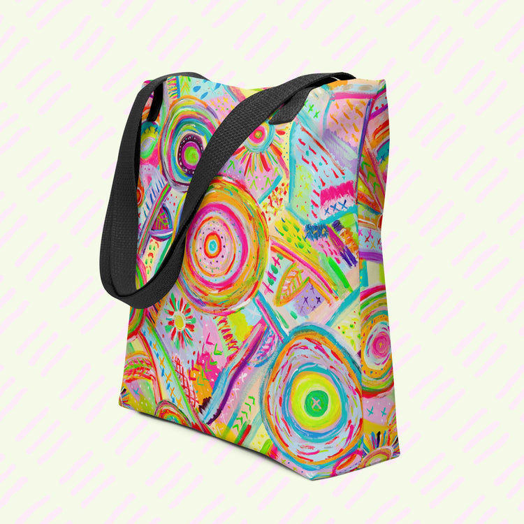 The Summer Sorbet Tote Bag by My Favourite Colour is Rainbow features my Summer Sorbet painting: vibrant abstract designs of circles and geometric shapes in bright pink, orange, blue, and green. This version features black handles.