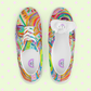 My Favourite Colour is Rainbows Summer Sorbet Canvas Sneakers feature abstract vibrant patterns with swirls, lines, and shapes in pink, yellow, green, and blue. The interior label is set against a soft green background dotted with pink stars—ideal for those embracing a lively style this season.