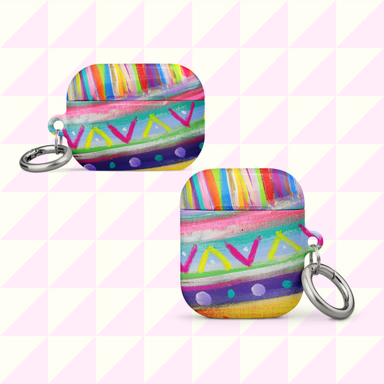 The Rainbow Connection AirPods Case by My Favourite Colour is Rainbow features abstract geometric patterns with rainbow hues of stripes and triangles. Each durable, impact-absorbing case includes a metal keychain ring. Shown on a pink and white geometric background.