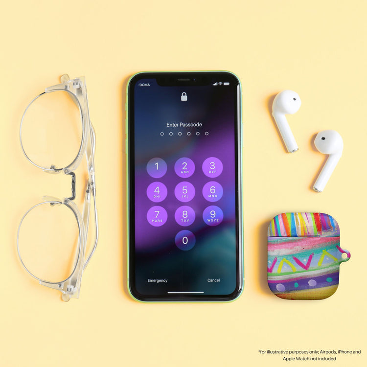 A smartphone with a passcode screen sits on a yellow surface beside clear glasses, white wireless earbuds, and The Rainbow Connection impact-absorbing AirPods case.