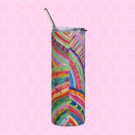 The Rainbow Connection Stainless Steel Tumbler by My Favourite Colour is Rainbow, featuring abstract rainbow designs, sits elegantly on a pink hexagonal background with a straw.